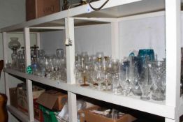 Large collection of glass including chrome coloured lamp, decanters, coloured glass, vases,