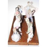 Collection of eight Lladro figures including two with parasols.