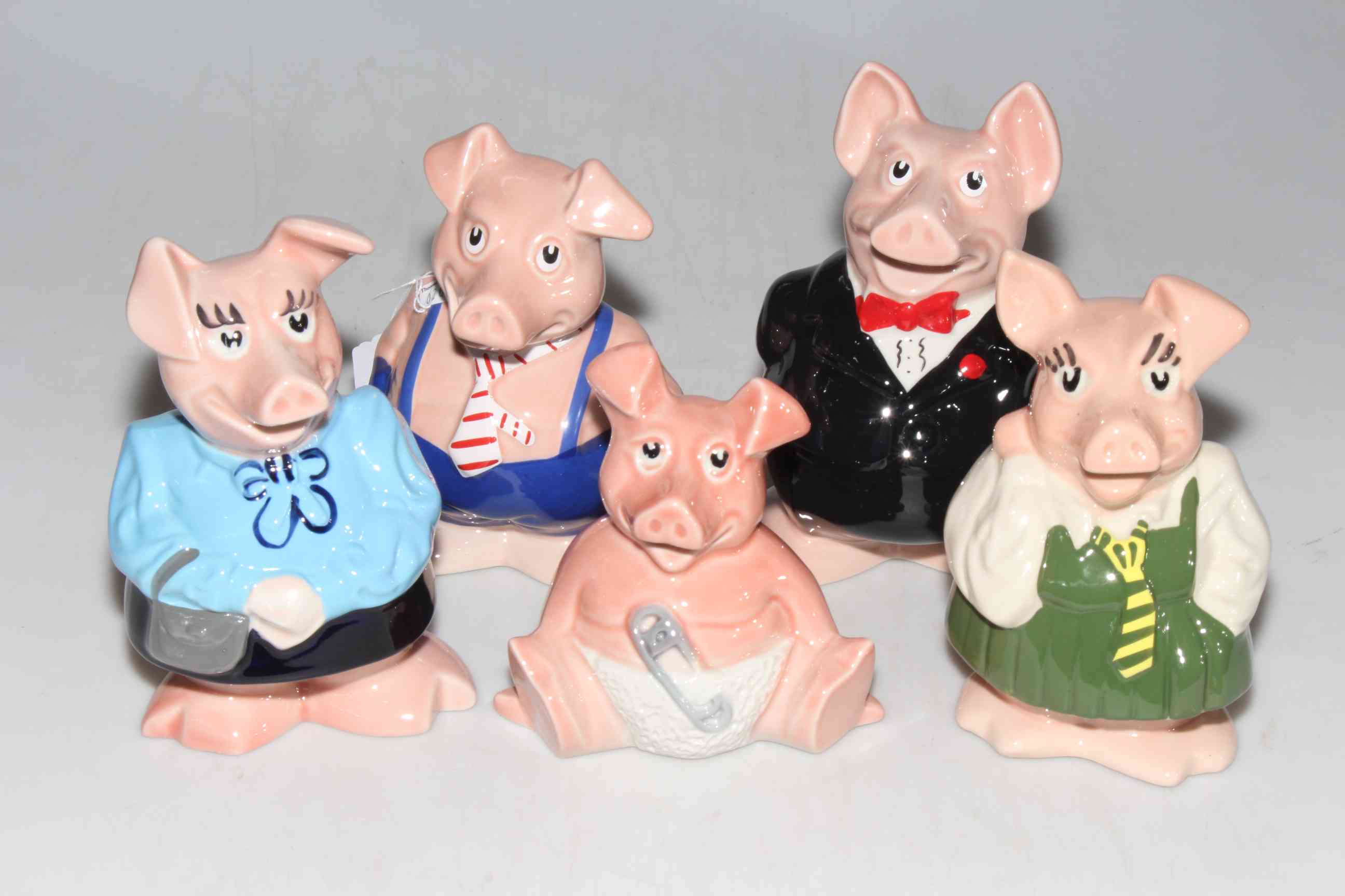 Five Wade Nat West piggy banks.