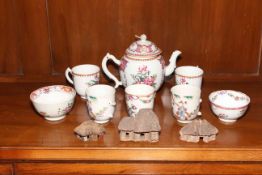 18th Century teapot and two matching cups, three further cups, two tea bowls, etc.