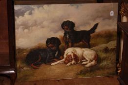 Oil painting on canvas of three resting hunting dogs, unsigned and unframed.