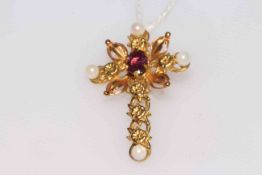 18 carat gold ornate cross pendant, set with amethyst and seed pearls, 3.2cm long.