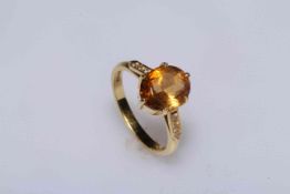 18 carat gold citrine and diamond ring, size M.