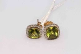 Pair 14k peridot and diamond earrings.