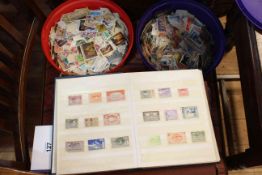 Collection of loose stamps and albums.