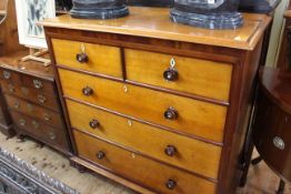 Victorian mahogany four height chest with turned wood and mother of pearl handles raised on turned