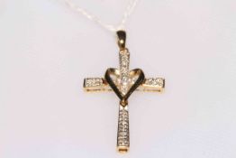 14k gold and diamond set cross pendant.