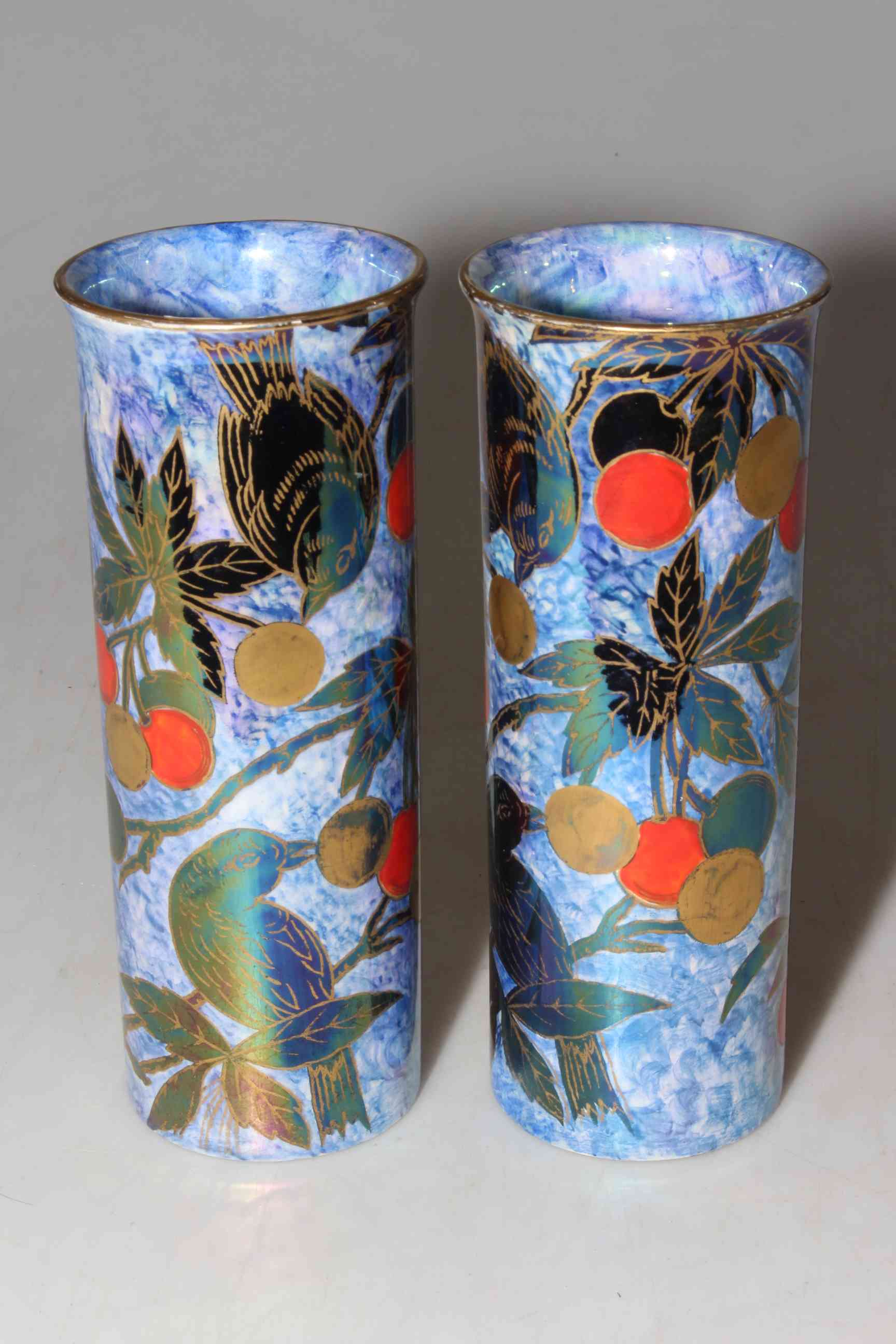 Pair of Maling lustre vases decorated with fruit, 20cm.