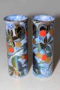 Pair of Maling lustre vases decorated with fruit, 20cm.