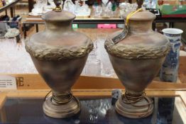 Pair of Luis Collection pottery table lamps.