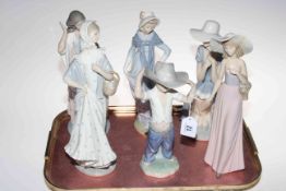 Six large Nao figures, five ladies and boy with large hat.