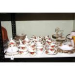 Royal Albert Country Roses service comprising seventy pieces and including two cake stands.