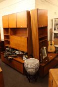 Two teak wall units, teak fall front shoe cabinet with shelves above.