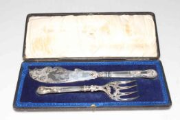 Cased Victorian silver fish servers, having engraved and pierced blades, Birmingham 1855.
