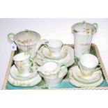 Shelley twenty one piece tea set with fenced landscape decoration, Reg No. 781613, Ideal China No.