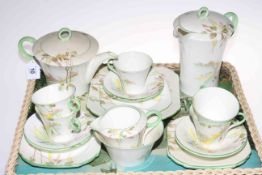 Shelley twenty one piece tea set with fenced landscape decoration, Reg No. 781613, Ideal China No.