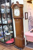 Antique oak eight day longcase clock with painted arch dial.