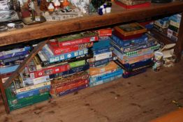 Large collection of approximately one hundred jigsaw puzzles.