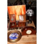 Horn handled steak knives, forks and servers, inlaid clock, Tiffany style table lamp,