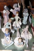 Collection of eight Lladro ballerina and Oriental figures.