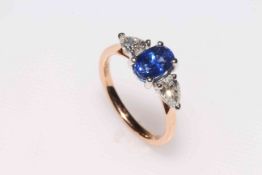 Fine sapphire and pear shape diamond and 18 carat gold ring, the oval sapphire approximately 1.