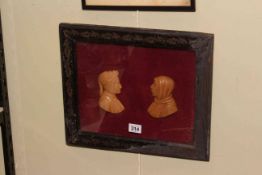 19th Century framed wax profiles of Dante and other, 32cm by 36cm.