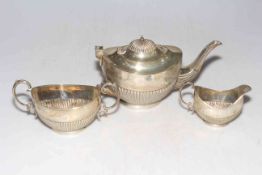Three piece silver part fluted tea set, Birmingham 1903.