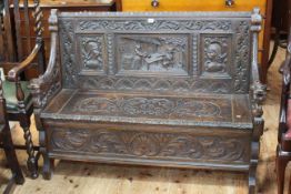 Victorian heavily carved box hall bench, 93cm high by 127cm wide by 45cm deep.