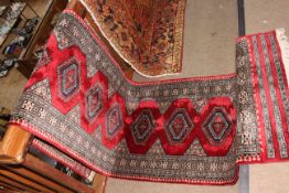 Hand made red ground Torkaman runner 315 by 83cm.