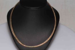 14k three colour gold three strand necklace.