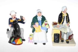 Three Royal Doulton figurines, Partners, The Rag Doll Seller and Captain Cook.