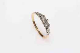 18 carat gold and three stone diamond ring, size M/N.