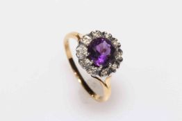 Amethyst and diamond 18 carat gold ring, having 1.8 carat amethyst with ten diamonds, size S/T.