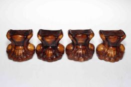 Set of four early 19th Century Staffordshire lions paw furniture rests.
