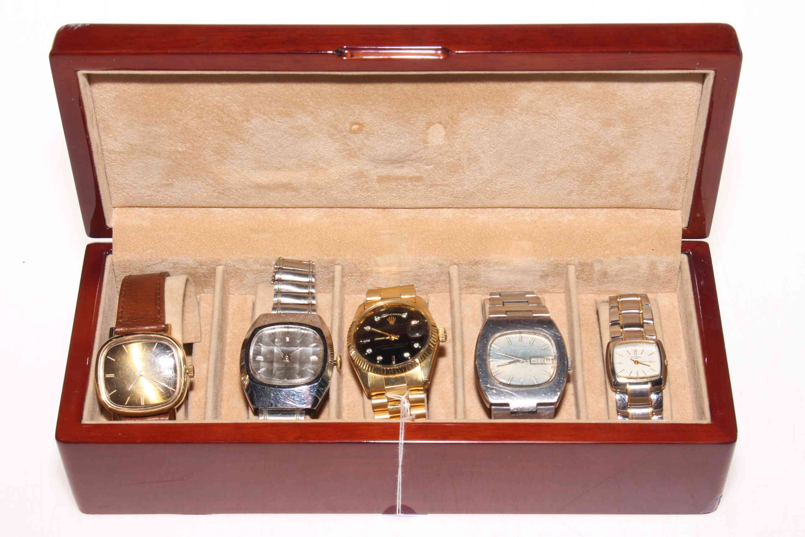 Box of five wristwatches.