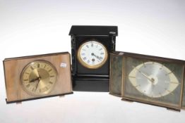 Three mantel clocks including a Victorian slate with a tine face and two Metamec Art Deco style.