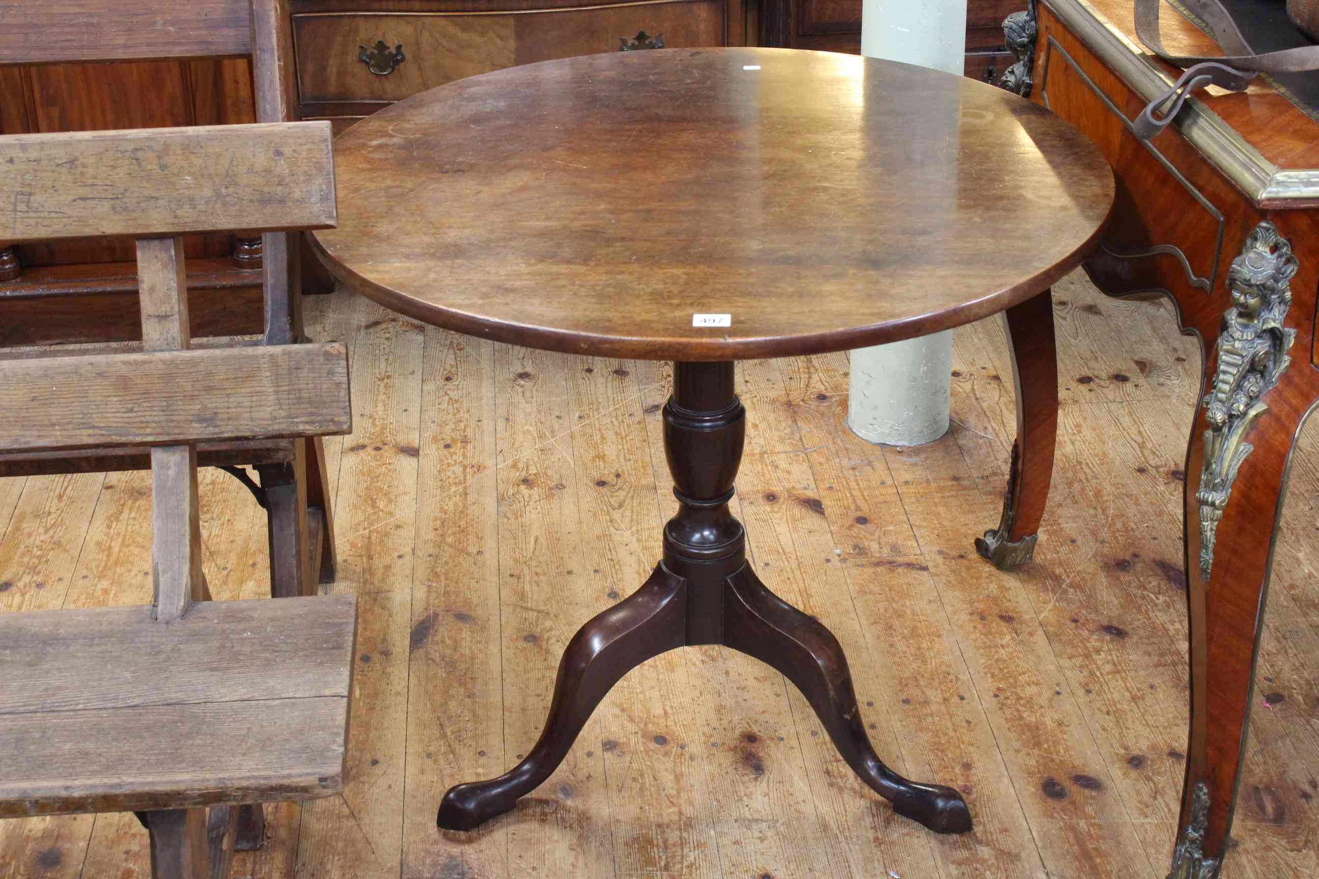 Georgian mahogany circular snap top supper table on turned pedestal tripod base,