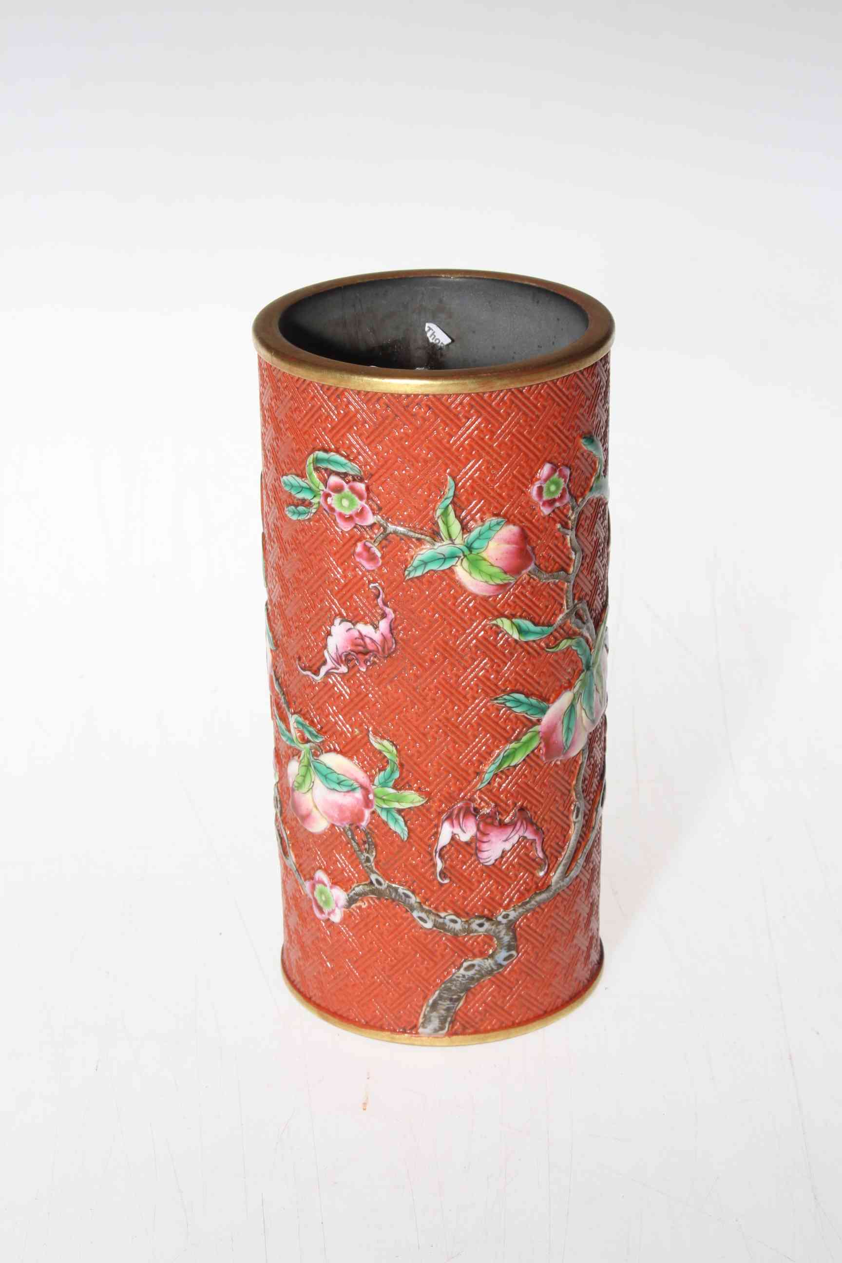 Chinese brush pot with relief blossom decoration, gilt seal mark, 14cm.