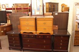 Stag Minstrel six drawer chest, pair four drawer pedestal chests and headboard,