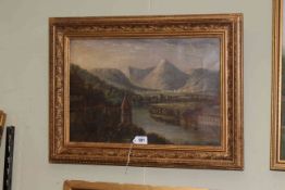 Gilt framed oil on canvas depicting an Asian landscape, 34cm by 50cm.