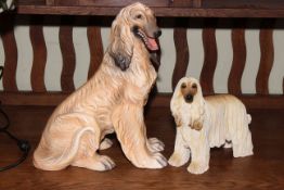 Large Italian pottery model of an Afghan hound and another resin Afghan hound, 41cm and 25cm.