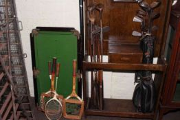 Vintage child's slate bed snooker table, snooker cue in case, tennis rackets, golf clubs.