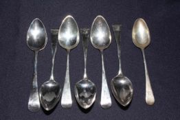 Seven George III silver Old English pattern dessert spoons, bearing crest,