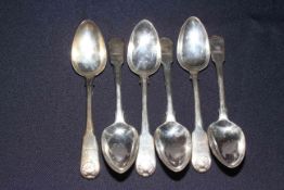 Set of six George III silver fiddle and shell pattern dessert spoons, bearing crest, London 1808.
