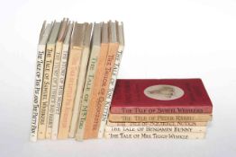 Collection of early Beatrix Potter books.