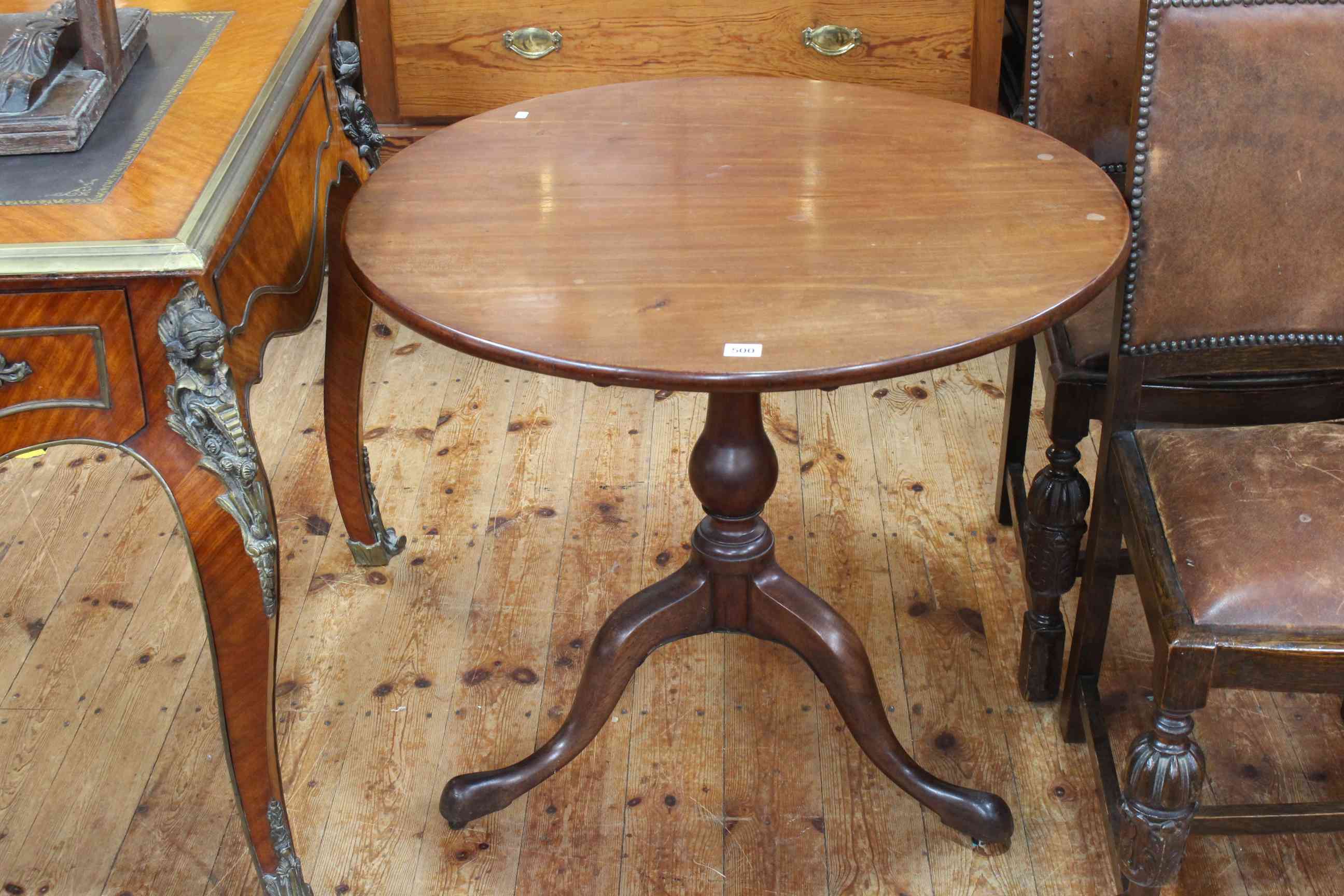 Georgian mahogany circular snap top supper table on turned pedestal tripod base,