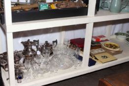 Four piece silver plated tea set and various silver plate, cased cutlery, glassware, place mats,