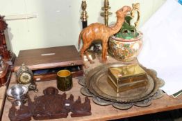 Two table lamps, Indian brass trays, leather camel, wood carving, photograph frame, cutlery, etc.