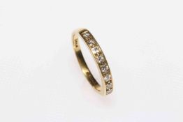 18 carat gold and diamond eight stone half eternity ring, size O/P.