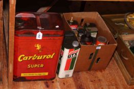 Carburol fuel can, Castrol fuel can and box of vintage oil and grease cans.